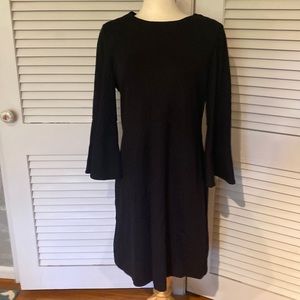 Thick black dress from the Limited. Made from nylon, rayon and spandex.